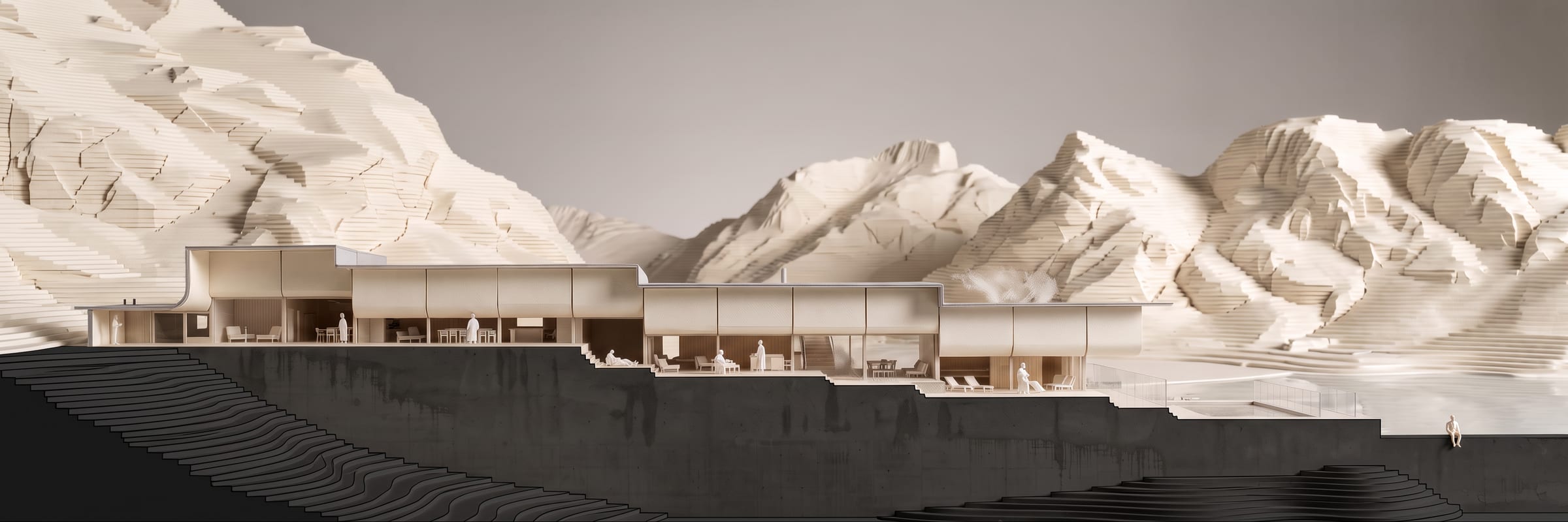 Model section of the bathhouse cut into layered card contours, with modelled mountains behind